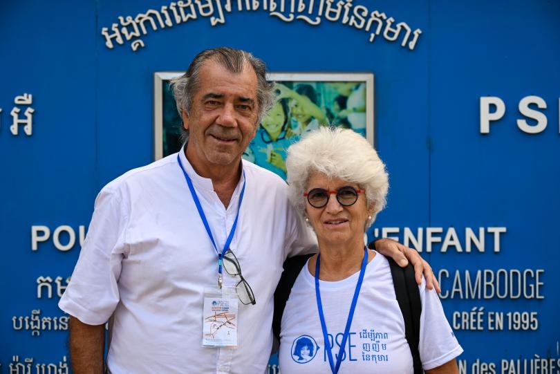 Marisa and her husband Fernando in front of the PSE entrance